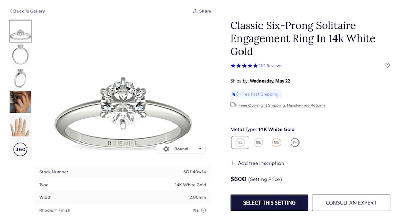 A classic six-prong solitaire engagement ring in 14k white gold displayed on Blue Nile's website. The ring setting is priced at $600 and is shown with a round diamond. It has a 2.00mm band width and a rhodium finish. The page highlights flexible payment options, free fast shipping, and hassle-free returns. The ring can be customized with additional metal types and a free inscription.