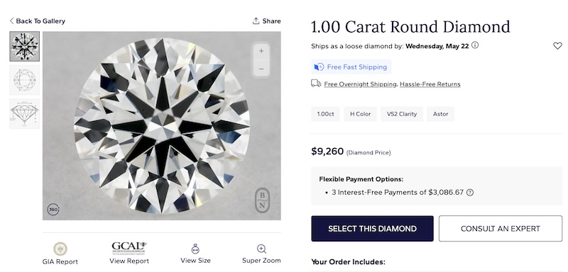 A 1.00 carat round diamond displayed on Blue Nile's website. The diamond is priced at $9,260 and features H color and VS2 clarity under the Astor signature range. The image shows a detailed close-up of the diamond, highlighting its facets. 